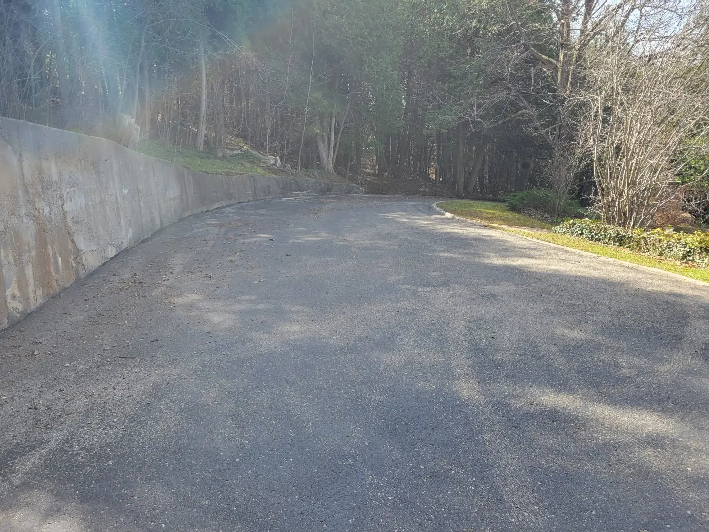 Before and after driveway repair Milton Ontario - Andy's Asphalt Sealing
