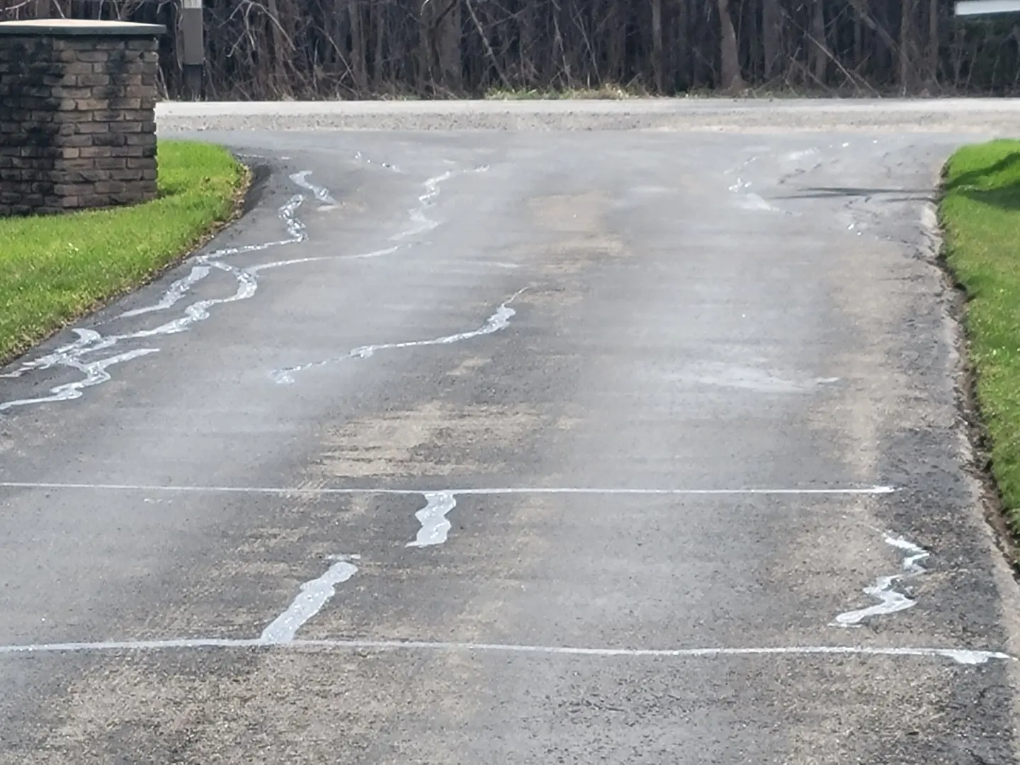 Before and after driveway repair Milton Ontario - Andy's Asphalt Sealing