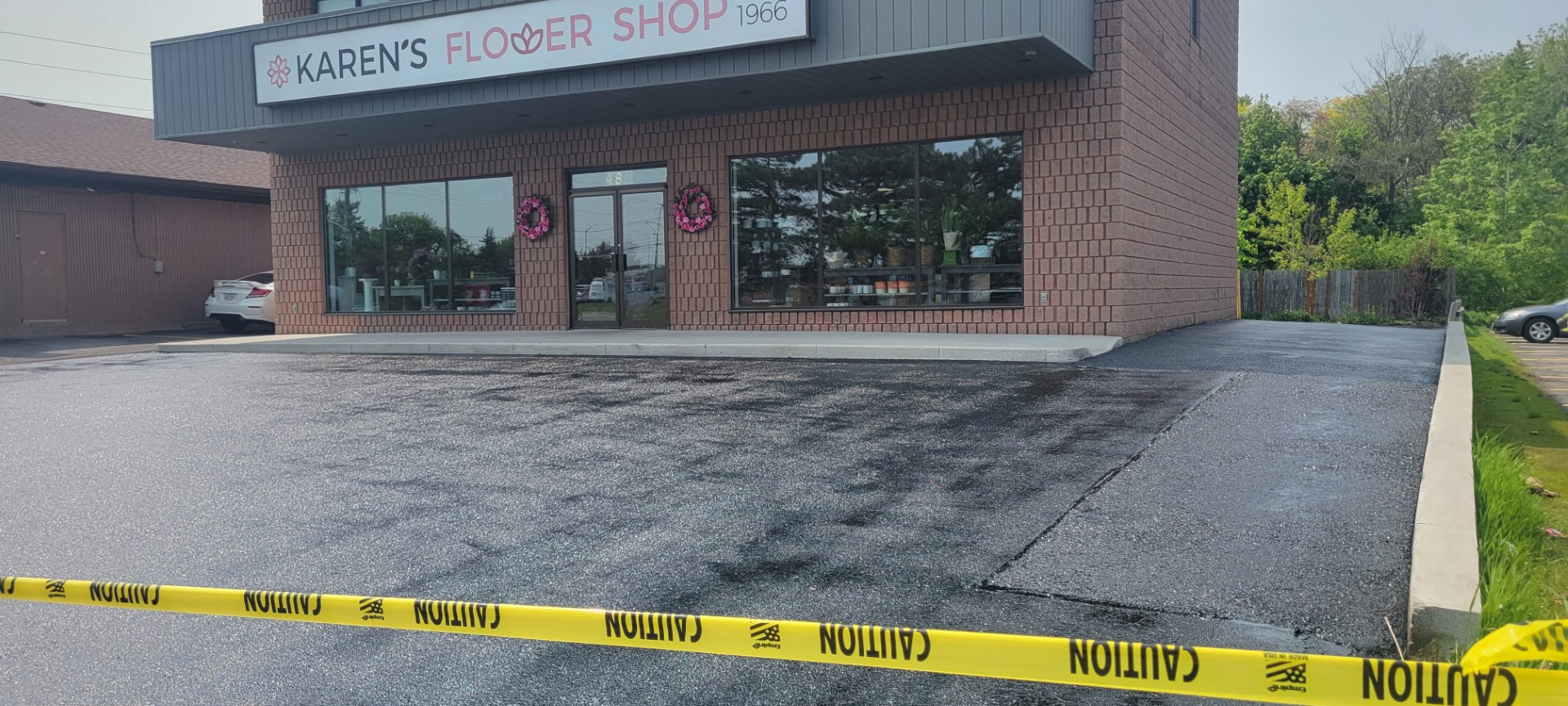 Commercial driveway sealing at Karen's Flower Shop - Andy's Asphalt Sealing