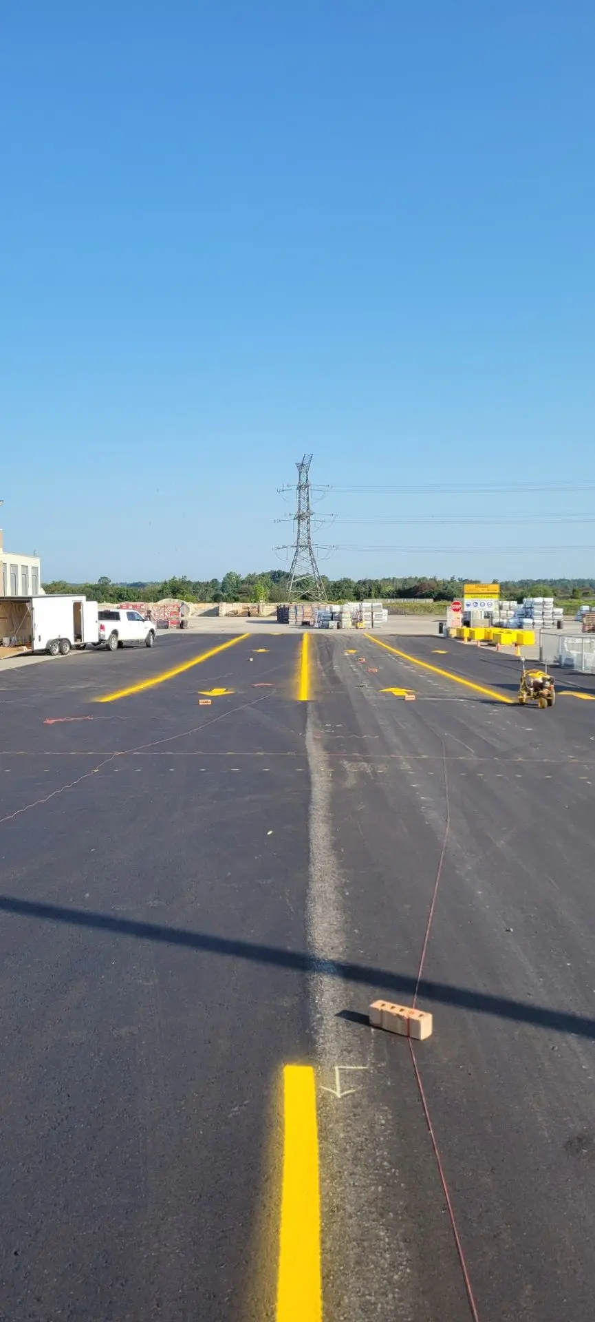Commercial asphalt repair at Permacon facility - Andy's Asphalt Sealing