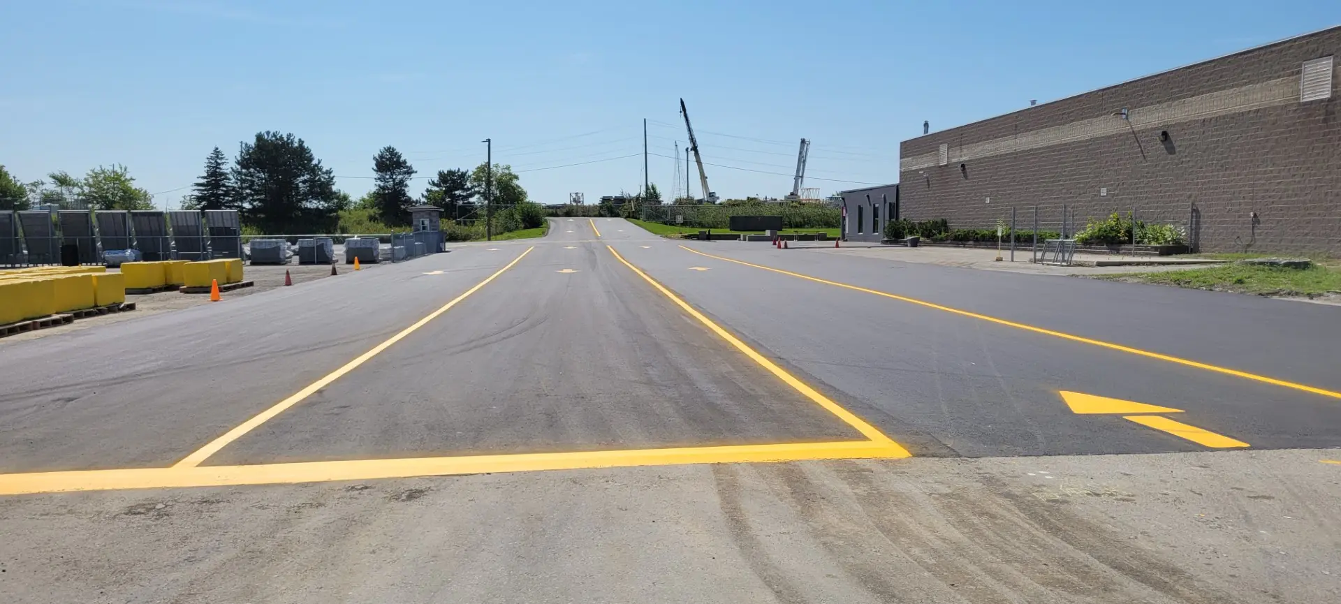 Commercial asphalt repair at Permacon facility - Andy's Asphalt Sealing