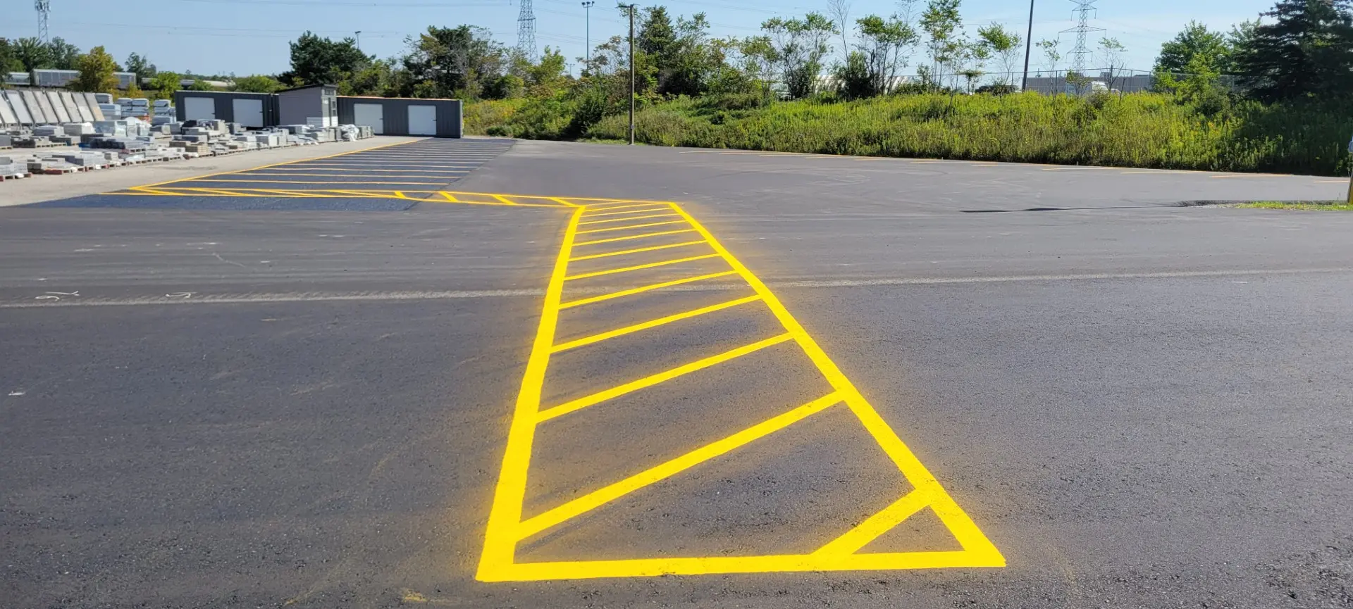 Commercial asphalt repair at Permacon facility - Andy's Asphalt Sealing