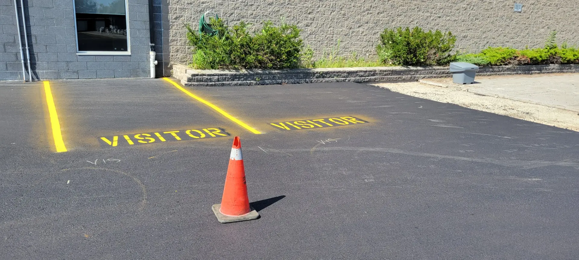 Commercial asphalt repair at Permacon facility - Andy's Asphalt Sealing